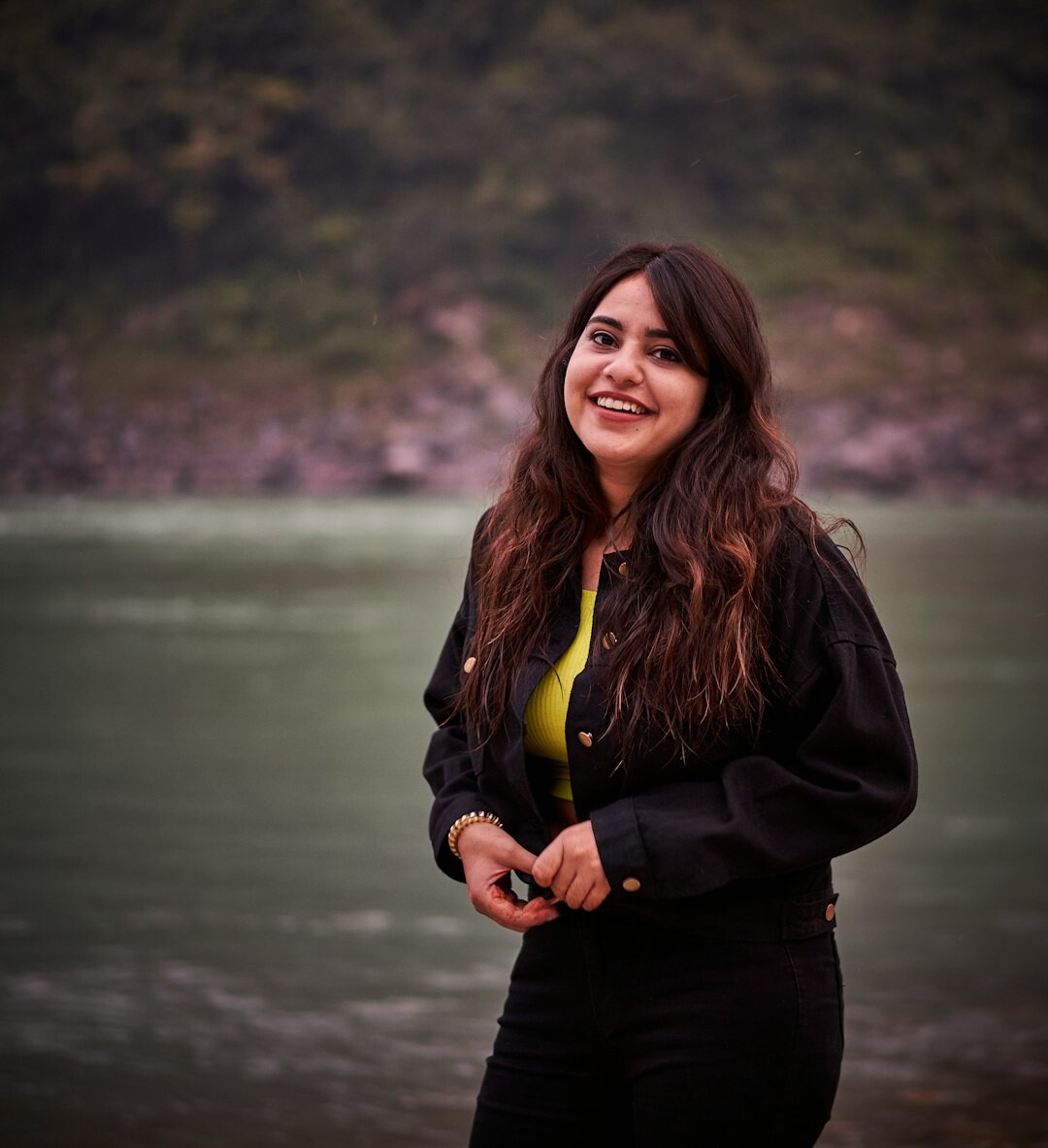 Portrait of a Chilean woman editor with dark hair and a blazer