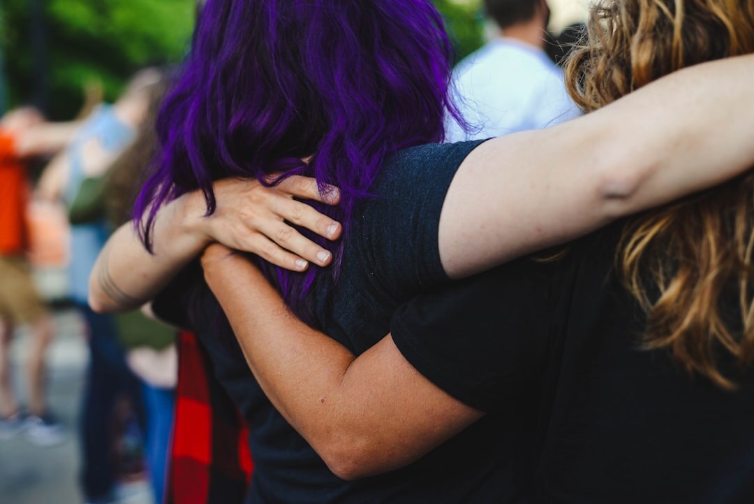 reunited friends hugging