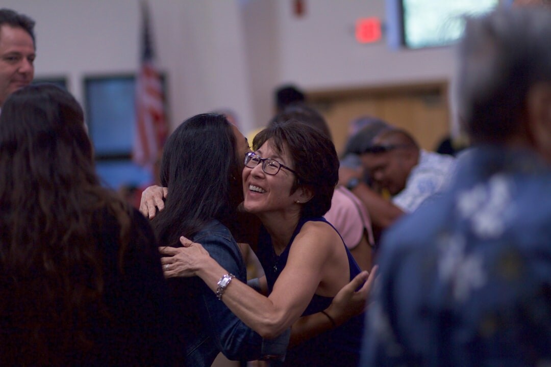 celebrity reunion hug