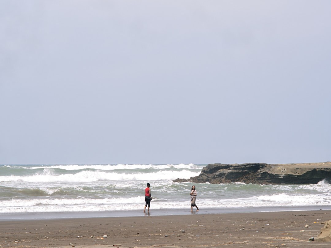 couple walking on beach
